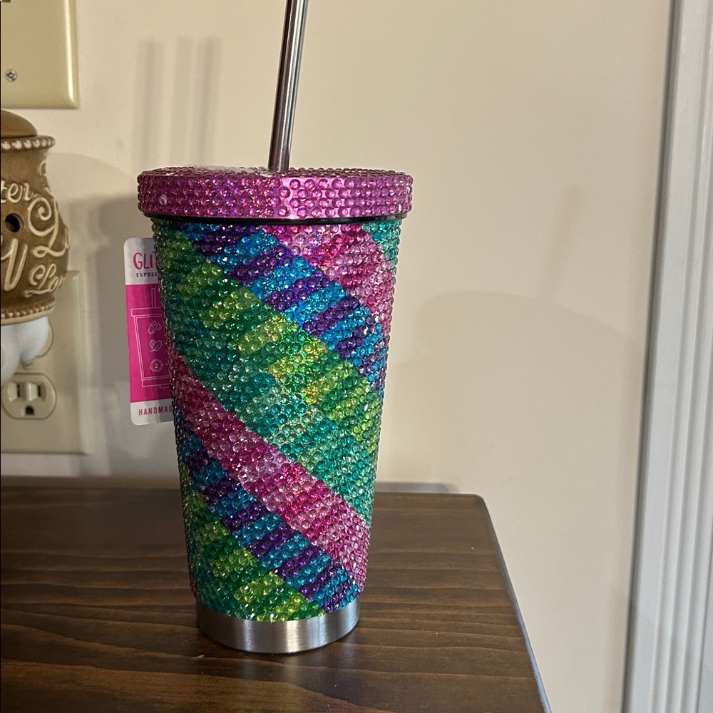 Colorful 20 ounce Rhinestone Tumbler with metal straw.
